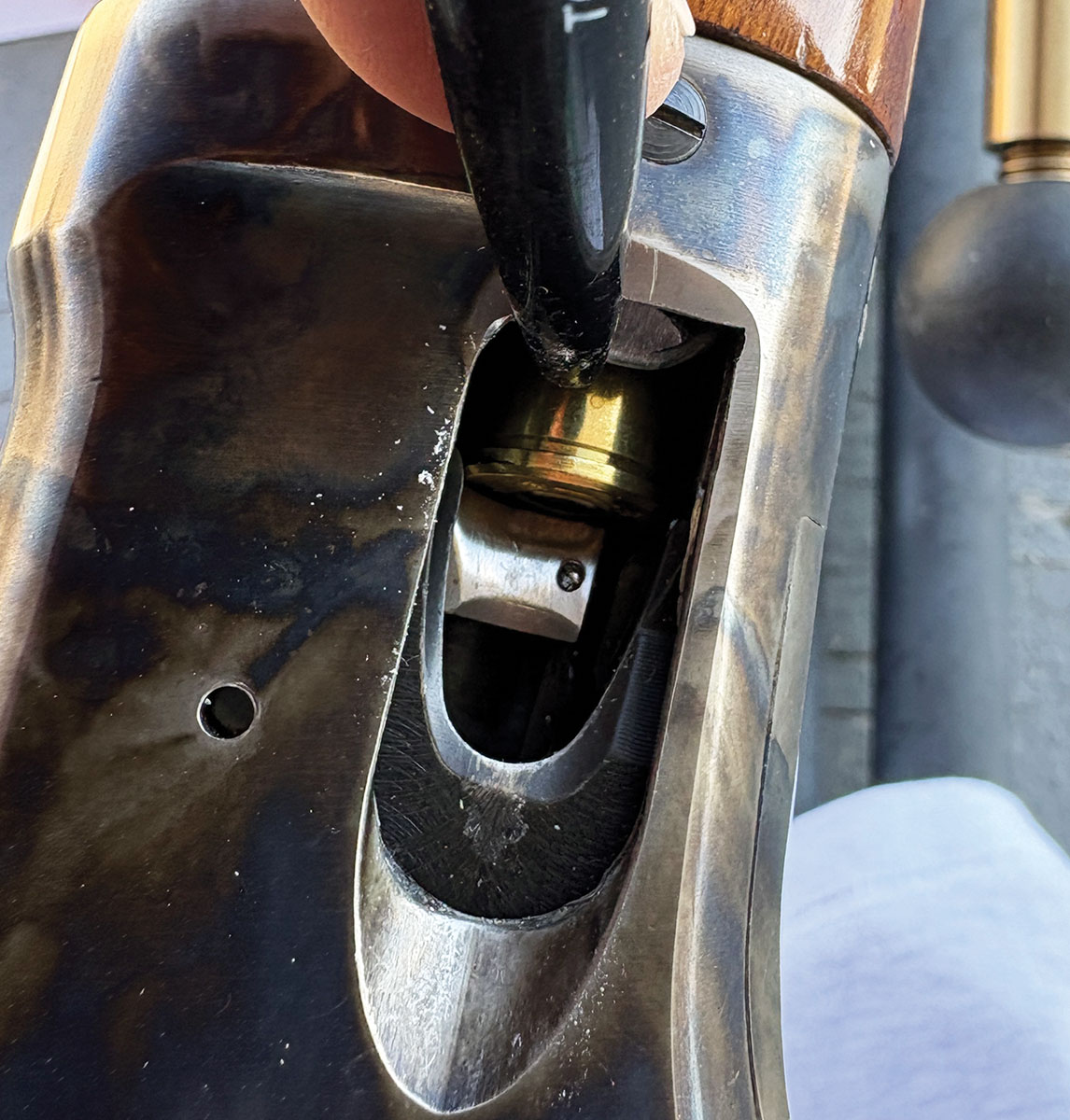 The Burgess has a cartridge catch to prevent accidental unloading.